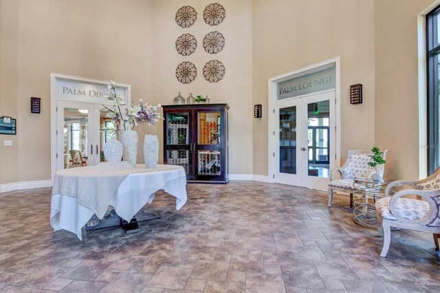 10466 Medjool Dr, Venice, FL 34293 - entrance foyer with a wealth of natural light, baseboards, and french doors