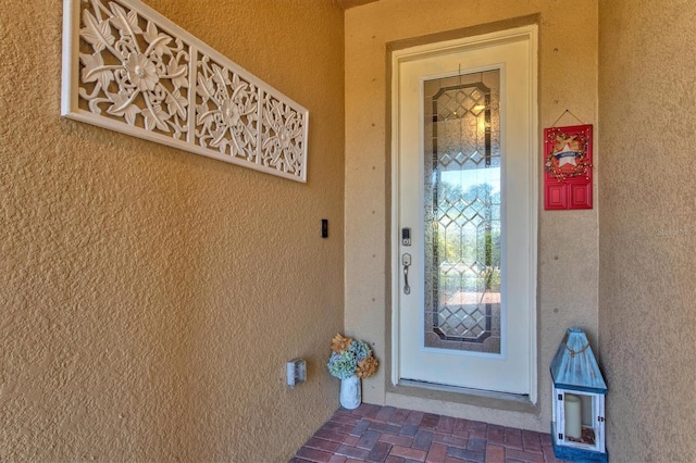 10466 Medjool Dr, Venice, FL 34293 - property entrance with stucco siding