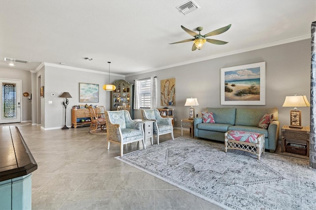 10466 Medjool Dr, Venice, FL 34293 - living room with light tile patterned flooring, a ceiling fan, baseboards, visible vents, and ornamental molding