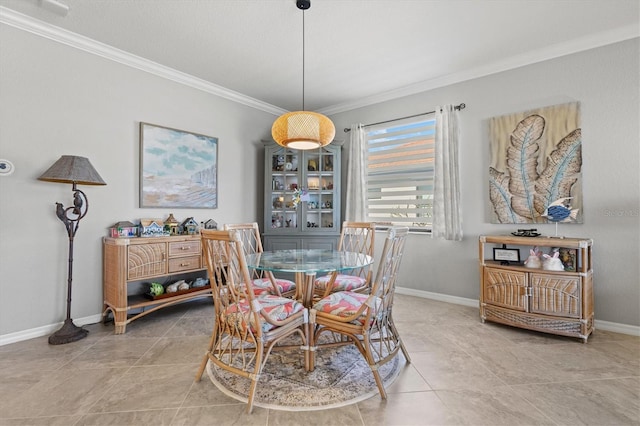 10466 Medjool Dr, Venice, FL 34293 - dining room with baseboards, tile patterned flooring, and crown molding