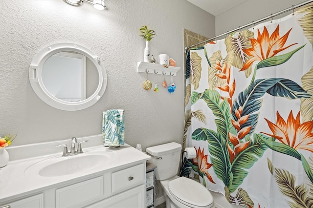 10466 Medjool Dr, Venice, FL 34293 - bathroom with a shower with curtain, a textured wall, toilet, and vanity