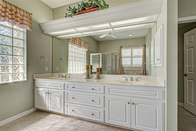408 Otter Creek Dr, Venice, FL 34292 - bathroom featuring ceiling fan, a stall shower, baseboards, double vanity, and tile patterned floors