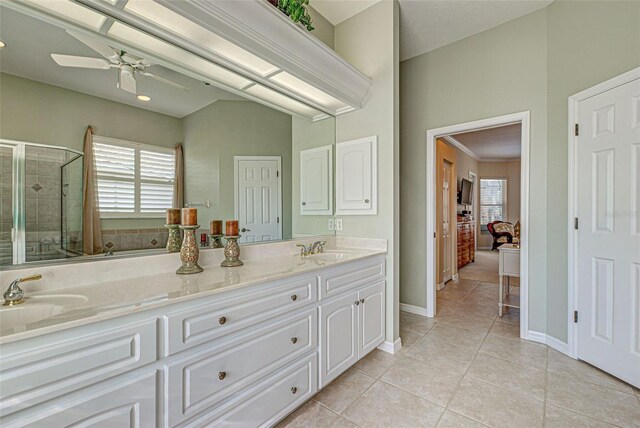 408 Otter Creek Dr, Venice, FL 34292 - bathroom with a shower stall, tile patterned floors, a ceiling fan, and plenty of natural light
