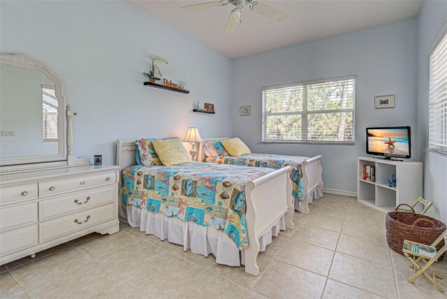 408 Otter Creek Dr, Venice, FL 34292 - bedroom featuring light tile patterned flooring and ceiling fan