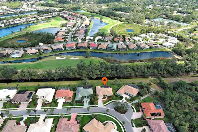 408 Otter Creek Dr, Venice, FL 34292 - aerial overview of property's location featuring nearby suburban area, a golf course, and a large body of water