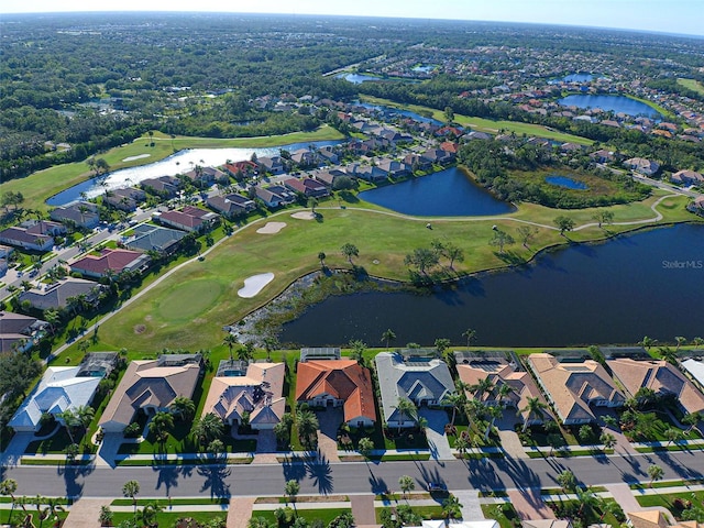 408 Otter Creek Dr, Venice, FL 34292 - aerial view of property and surrounding area with nearby suburban area, a nearby body of water, and a local golf course