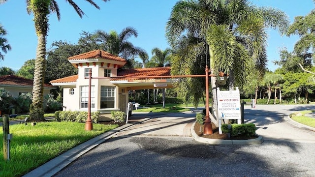 408 Otter Creek Dr, Venice, FL 34292 - view of asphalt road featuring curbs