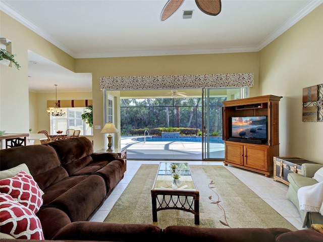 408 Otter Creek Dr, Venice, FL 34292 - living area featuring tile patterned flooring, ceiling fan, crown molding, and a chandelier