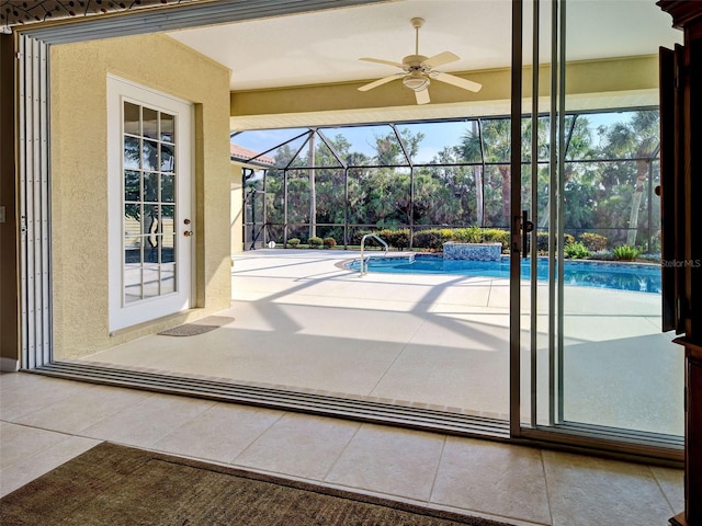 408 Otter Creek Dr, Venice, FL 34292 - entryway with a ceiling fan, tile patterned floors, and a sunroom