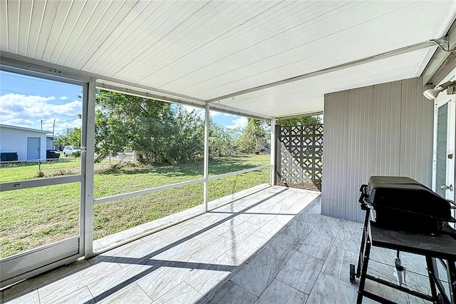 sunroom featuring a healthy amount of sunlight