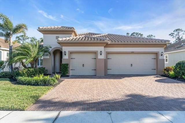 mediterranean / spanish-style home featuring a garage