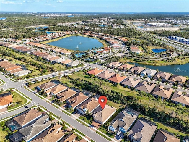 aerial view featuring a water view