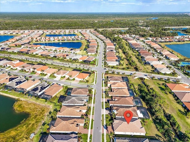 bird's eye view with a water view