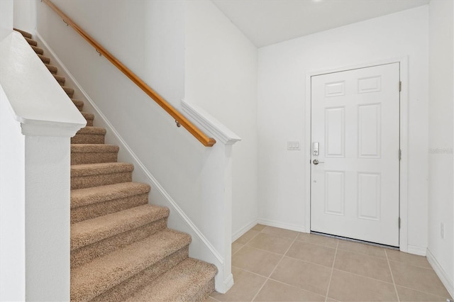 view of tiled foyer entrance