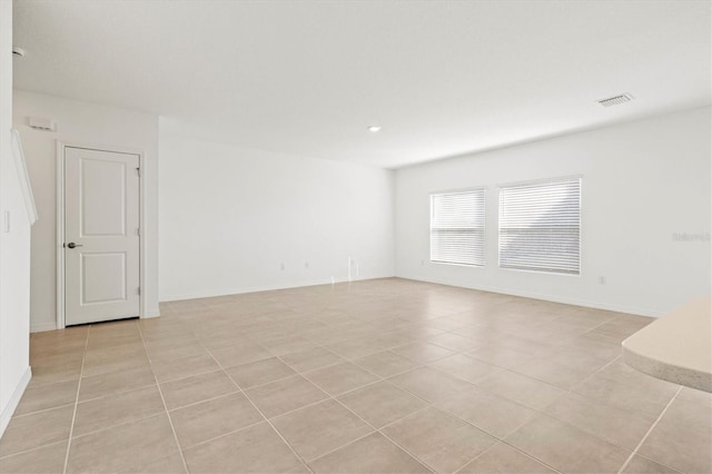 view of tiled spare room