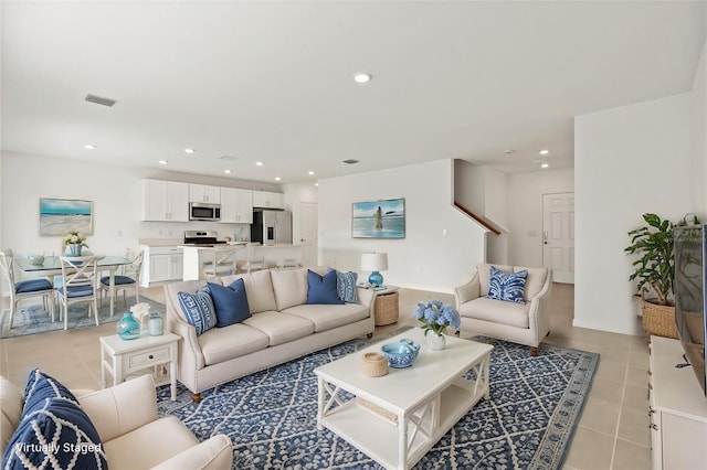 living room featuring light tile patterned floors