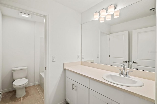 full bathroom with vanity, bathtub / shower combination, tile patterned floors, and toilet