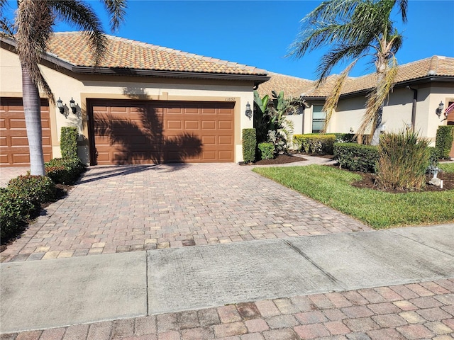 view of front of home with a garage