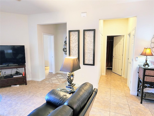 living room with light tile patterned floors