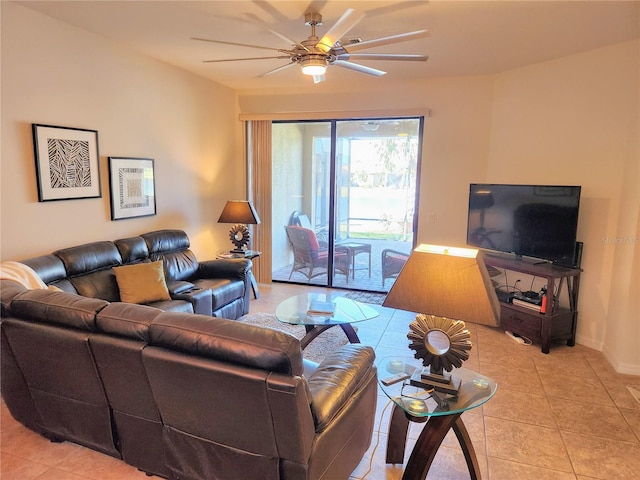 tiled living room with ceiling fan