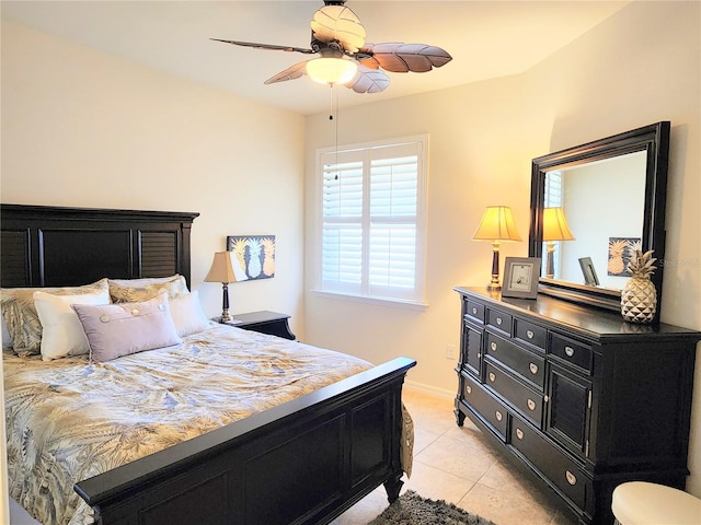 bedroom with light tile patterned floors and ceiling fan