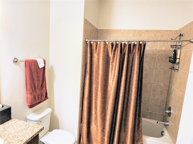 full bathroom with vanity, shower / bathtub combination with curtain, and toilet