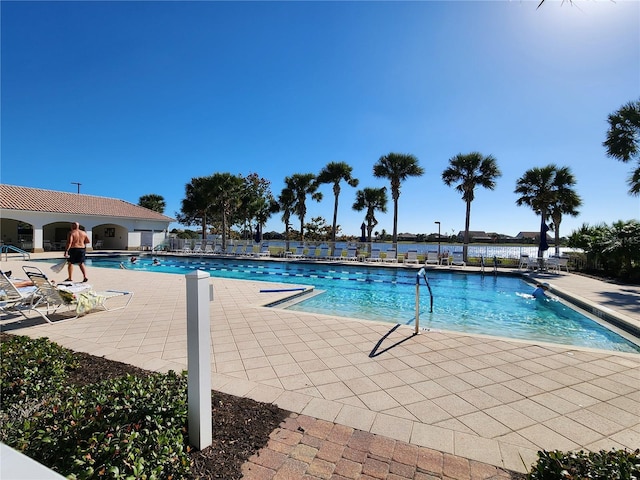 view of swimming pool featuring a patio