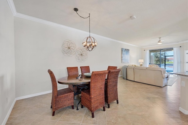 tiled dining room featuring crown molding and ceiling fan with notable chandelier