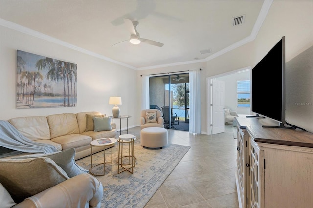 tiled living room featuring ornamental molding and ceiling fan