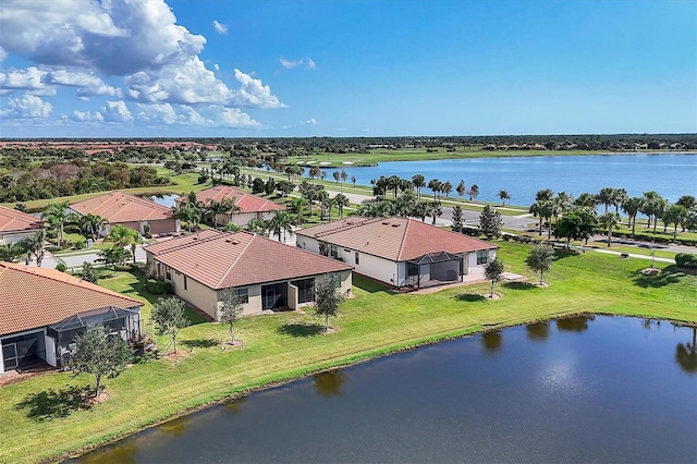 drone / aerial view with a water view