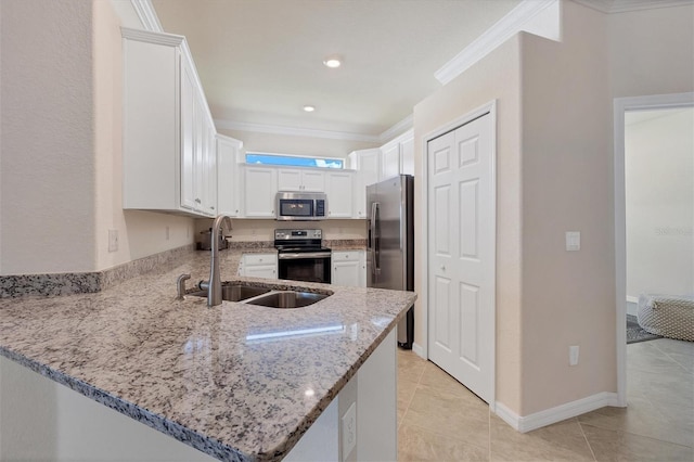 kitchen featuring white cabinetry, sink, light stone counters, kitchen peninsula, and stainless steel appliances