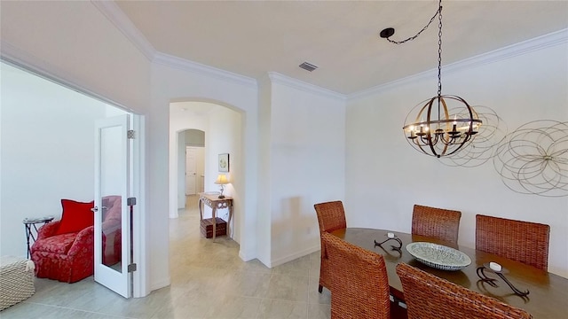 tiled dining space with crown molding and a notable chandelier