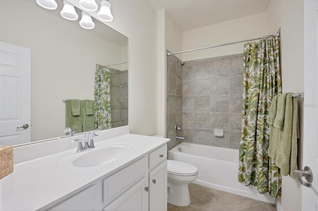 full bathroom featuring shower / bath combination with curtain, tile patterned floors, toilet, and vanity