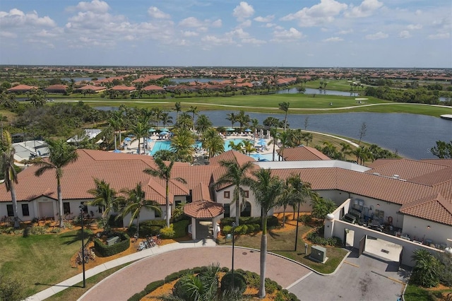 drone / aerial view with a water view