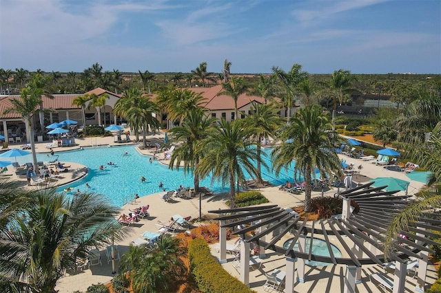 view of swimming pool featuring a patio area