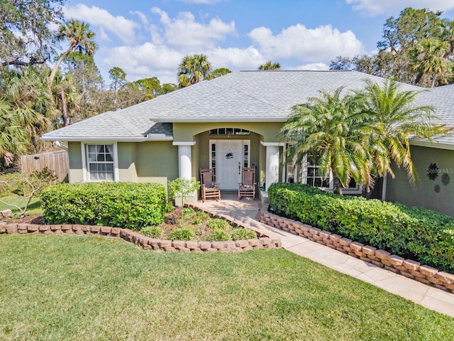 ranch-style house with a front yard