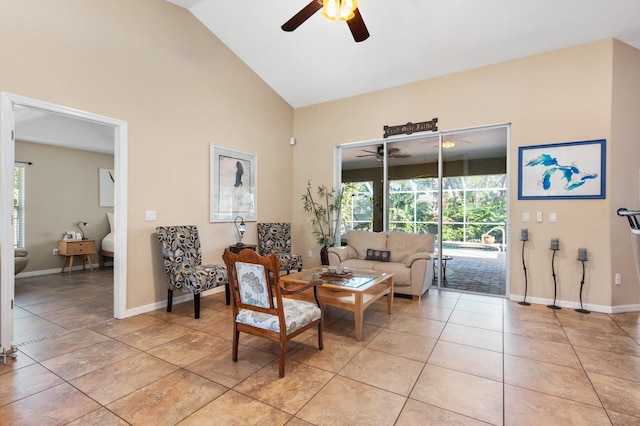 tiled living room featuring a wealth of natural light, high vaulted ceiling, and ceiling fan