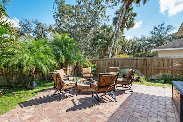 view of patio / terrace featuring a fire pit