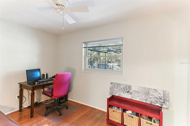 office space with hardwood / wood-style flooring and ceiling fan