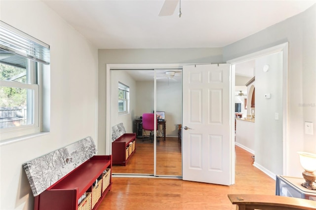 interior space featuring ceiling fan and hardwood / wood-style floors