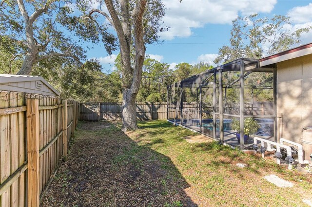 view of yard featuring a fenced in pool