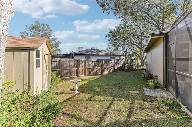 view of yard with a storage shed