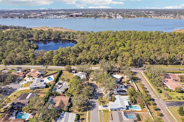 birds eye view of property featuring a water view