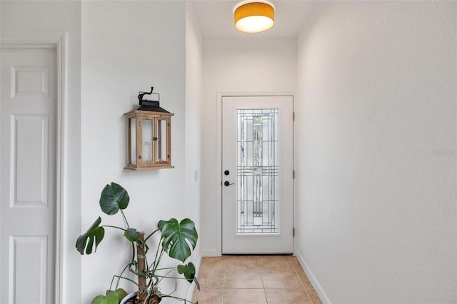 entryway featuring light tile patterned floors