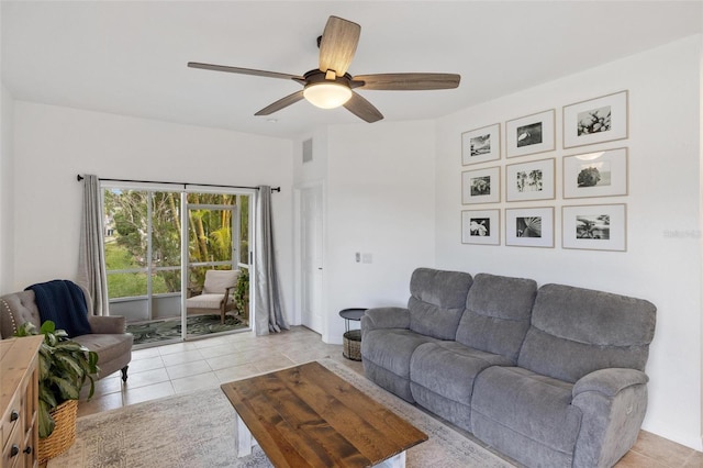 tiled living room featuring ceiling fan