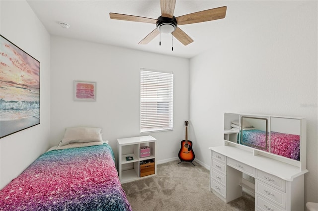 carpeted bedroom with ceiling fan