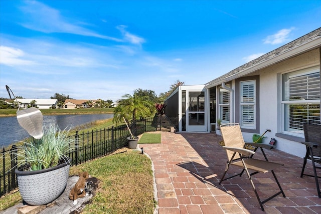 view of patio / terrace with a water view