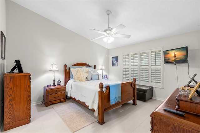 bedroom with lofted ceiling and ceiling fan