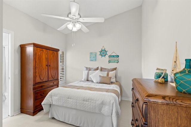 bedroom with vaulted ceiling and ceiling fan