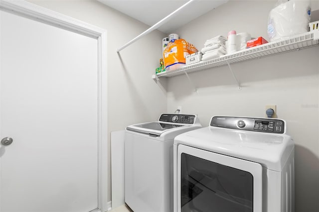 laundry area with washer and dryer